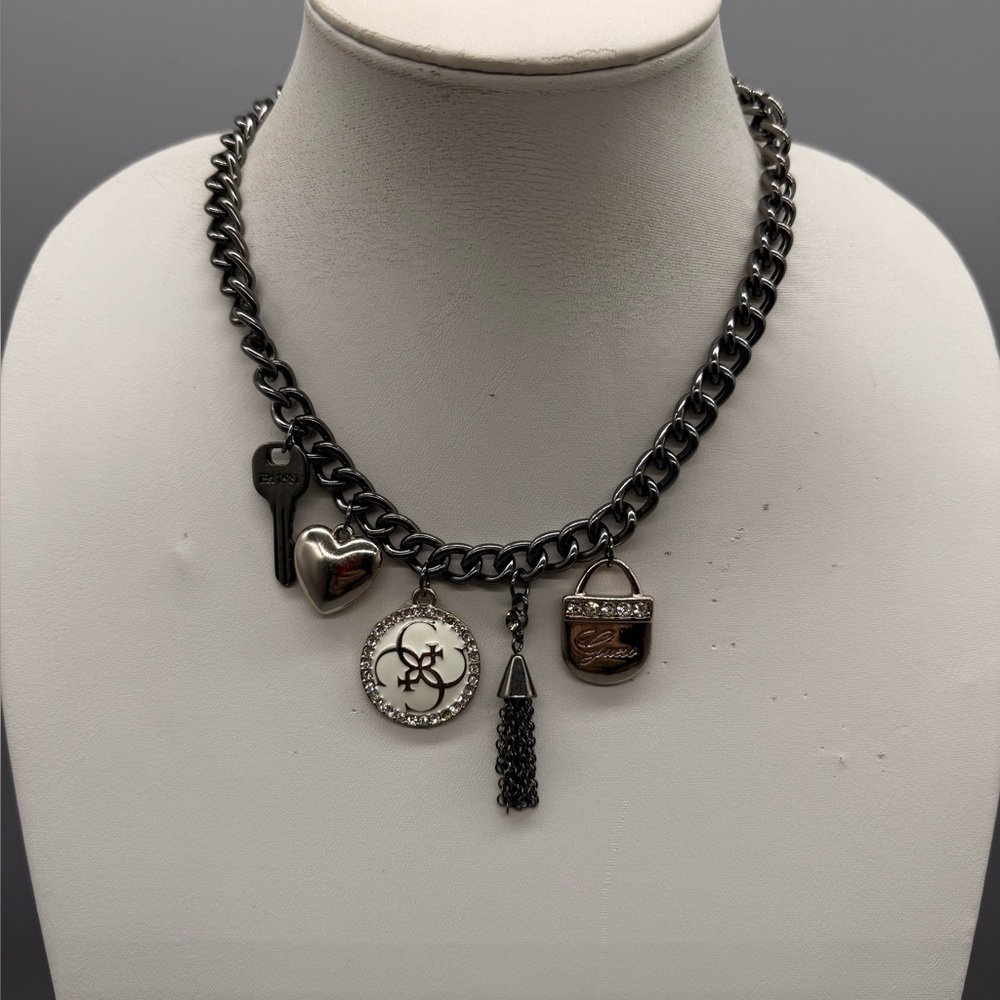 Stylish Black and Silver Charm Necklace
By Guess